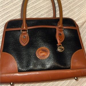 Dooney & Bourke Black with Brown Trim Leather Satchel